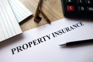 Paper with property insurance written at the top