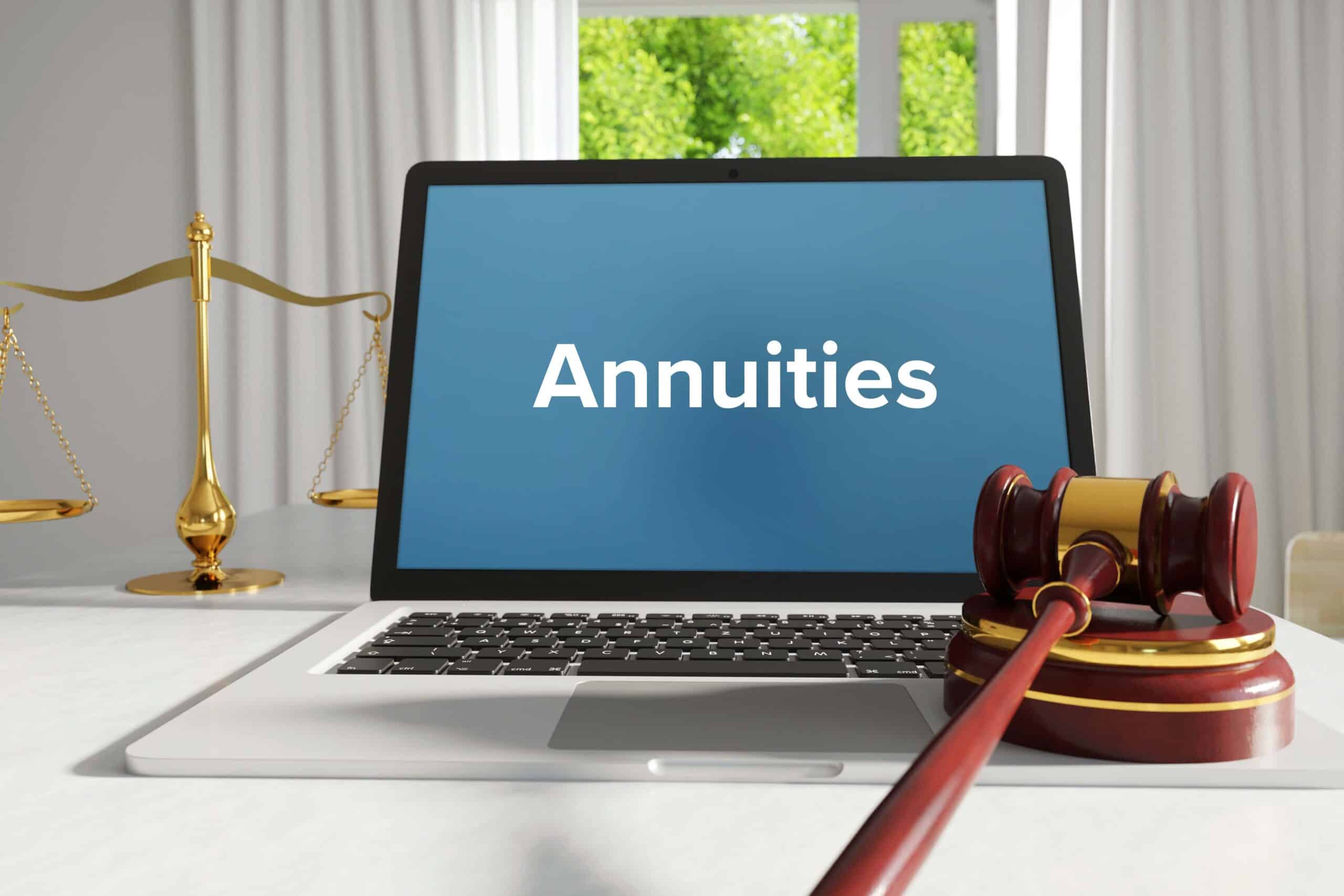 Laptop with "annuities" on the screen.